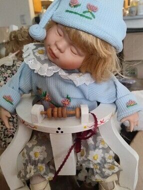 Porcelain Baby Doll in Light Blue Outfit